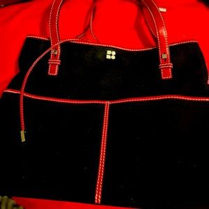Used Kate spade purse black and red used three times very very clean lining